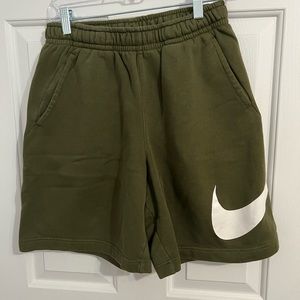 Green Nike shorts